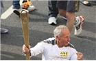 Keith Songhurst carries Olympic Torch